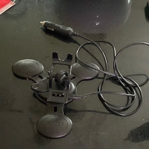 Garmin has a weighted pad to put your GPS on